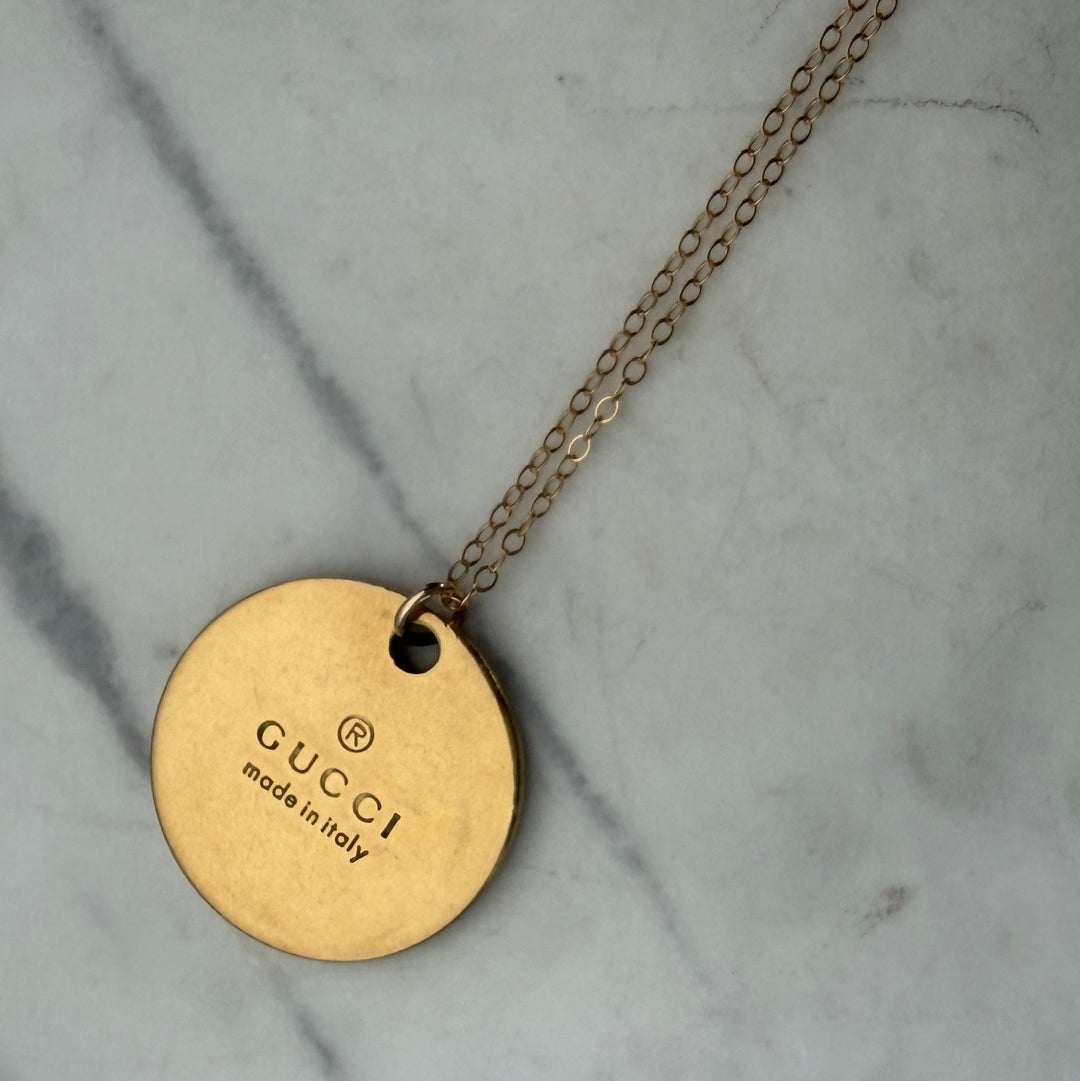 Gold Round Stamped Emblem Necklace