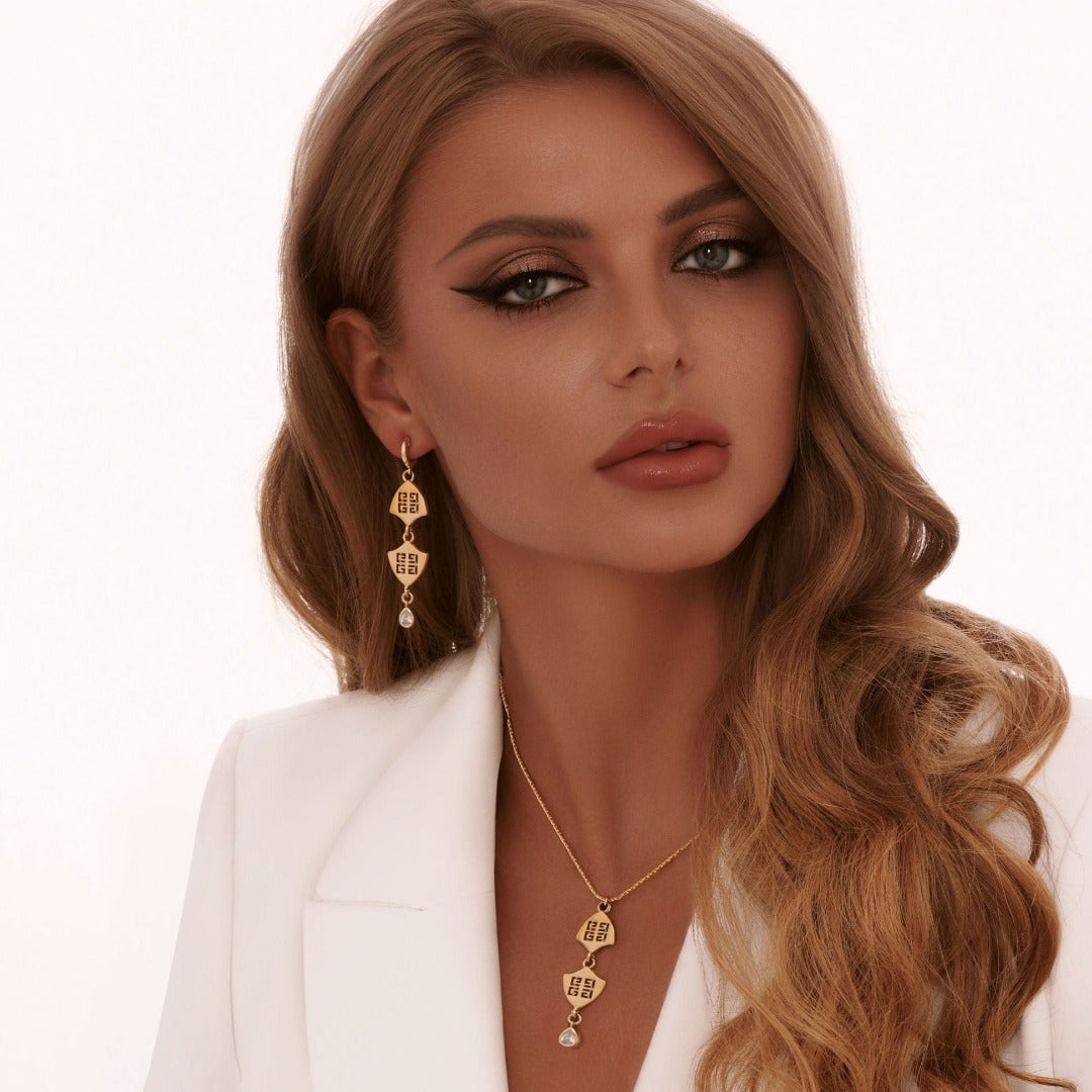 Statement Gold Double Logo Earrings with Crystal Drop