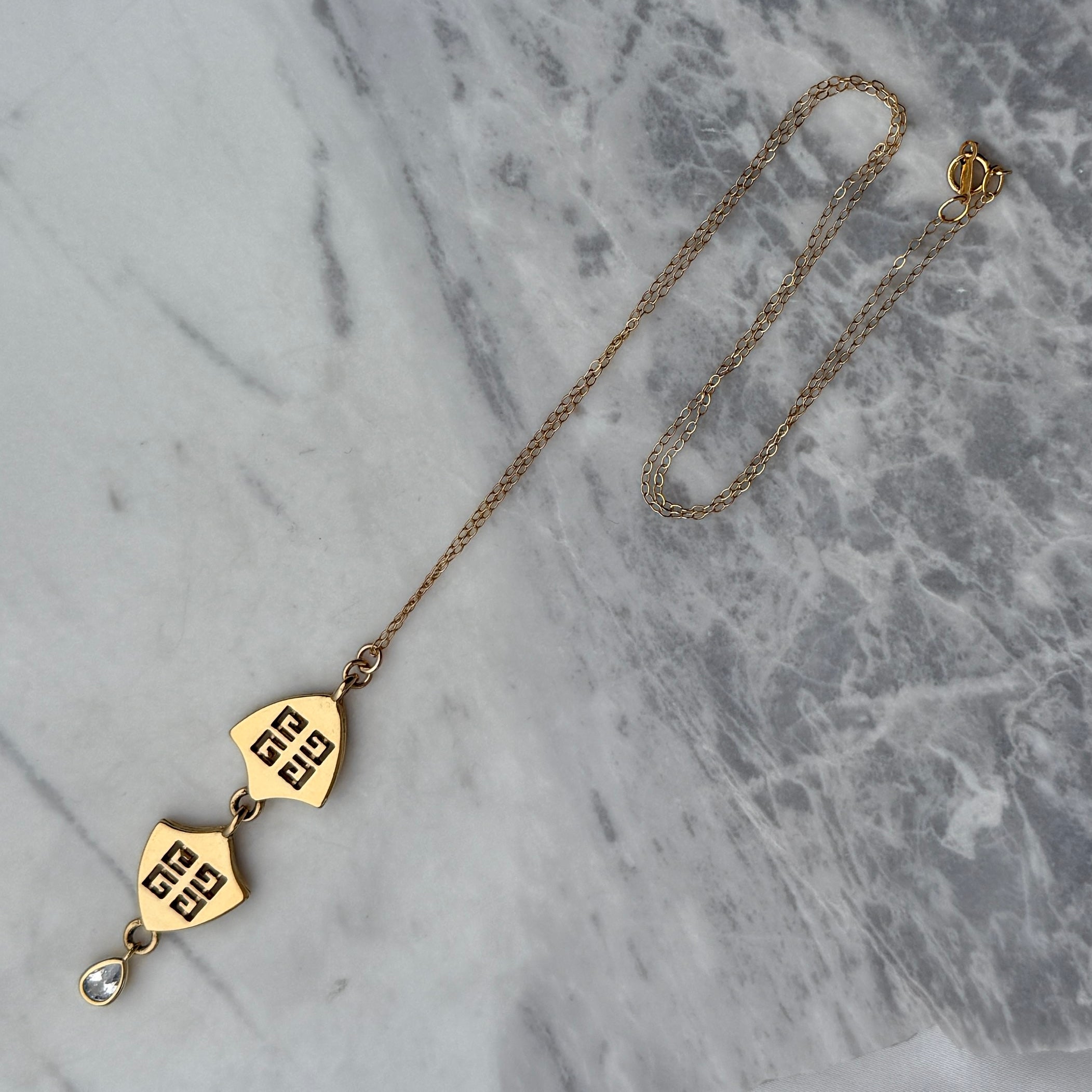 Statement Gold Double Logo Necklace with Crystal Drop