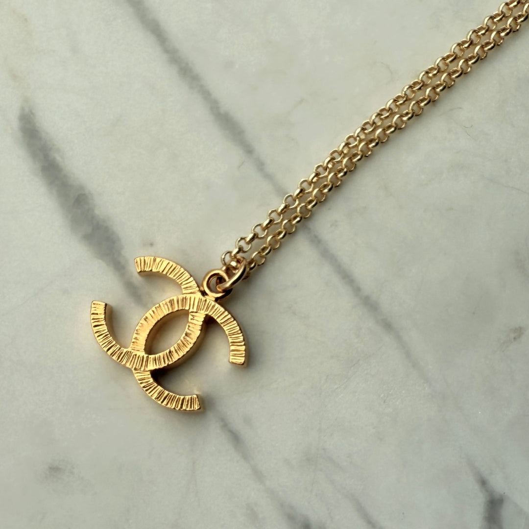 Textured Gold Logo Necklace