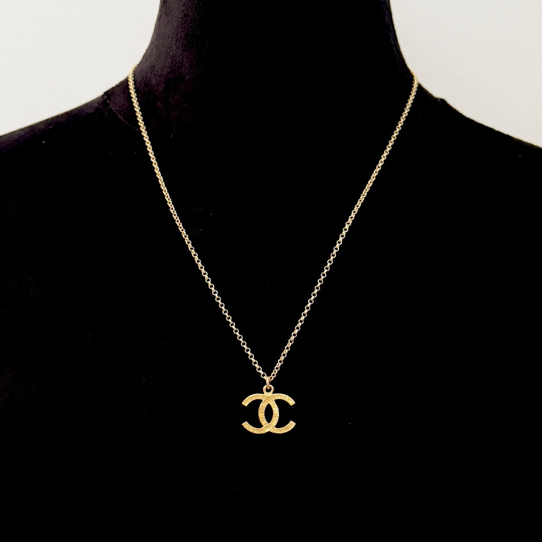 Textured Gold Logo Necklace