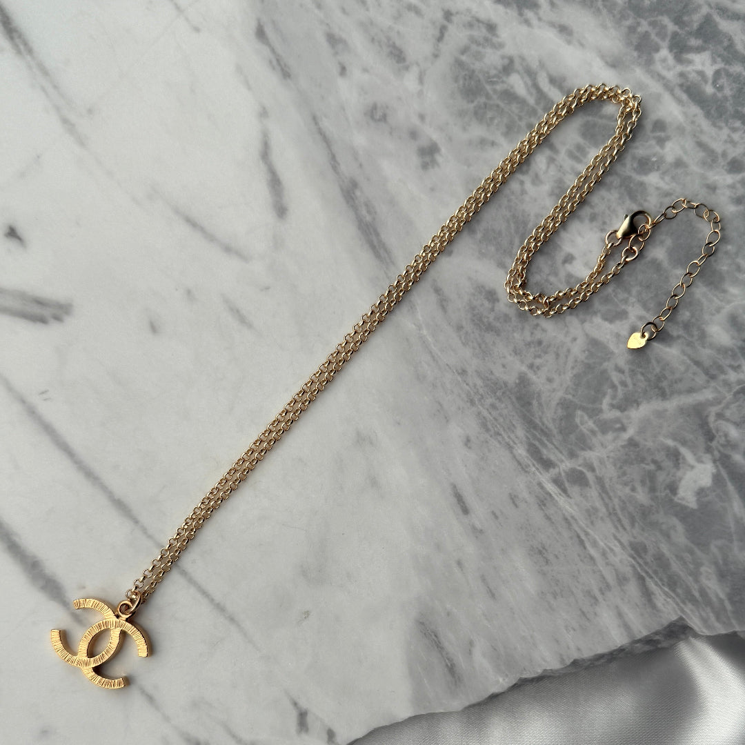 Textured Gold Logo Necklace