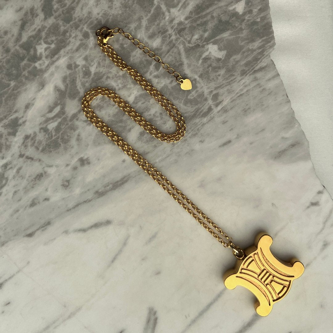 Statement Gold Logo Necklace