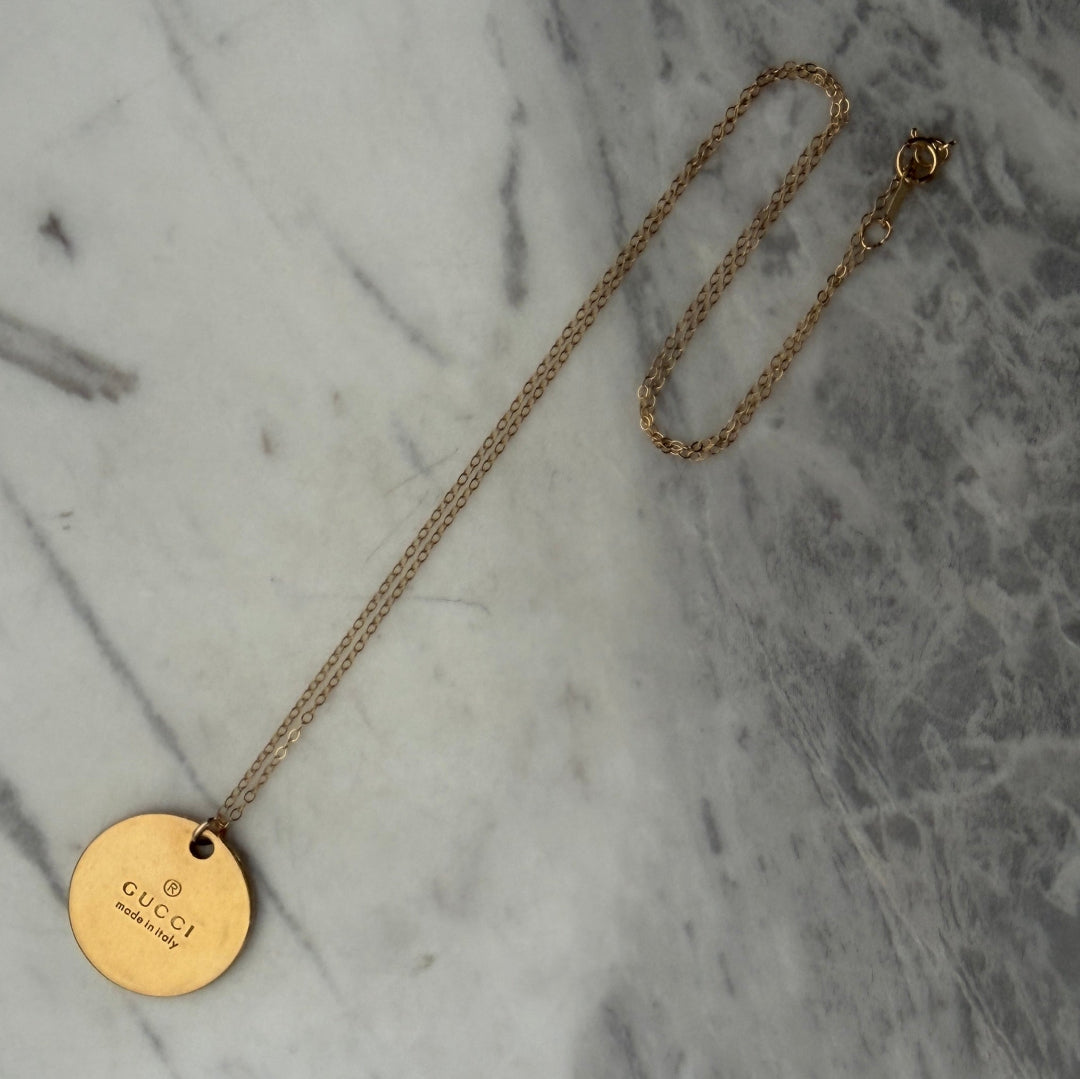 Gold Round Stamped Emblem Necklace