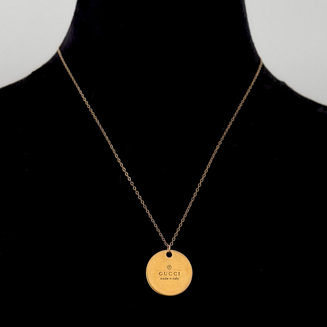 Gold Round Stamped Emblem Necklace