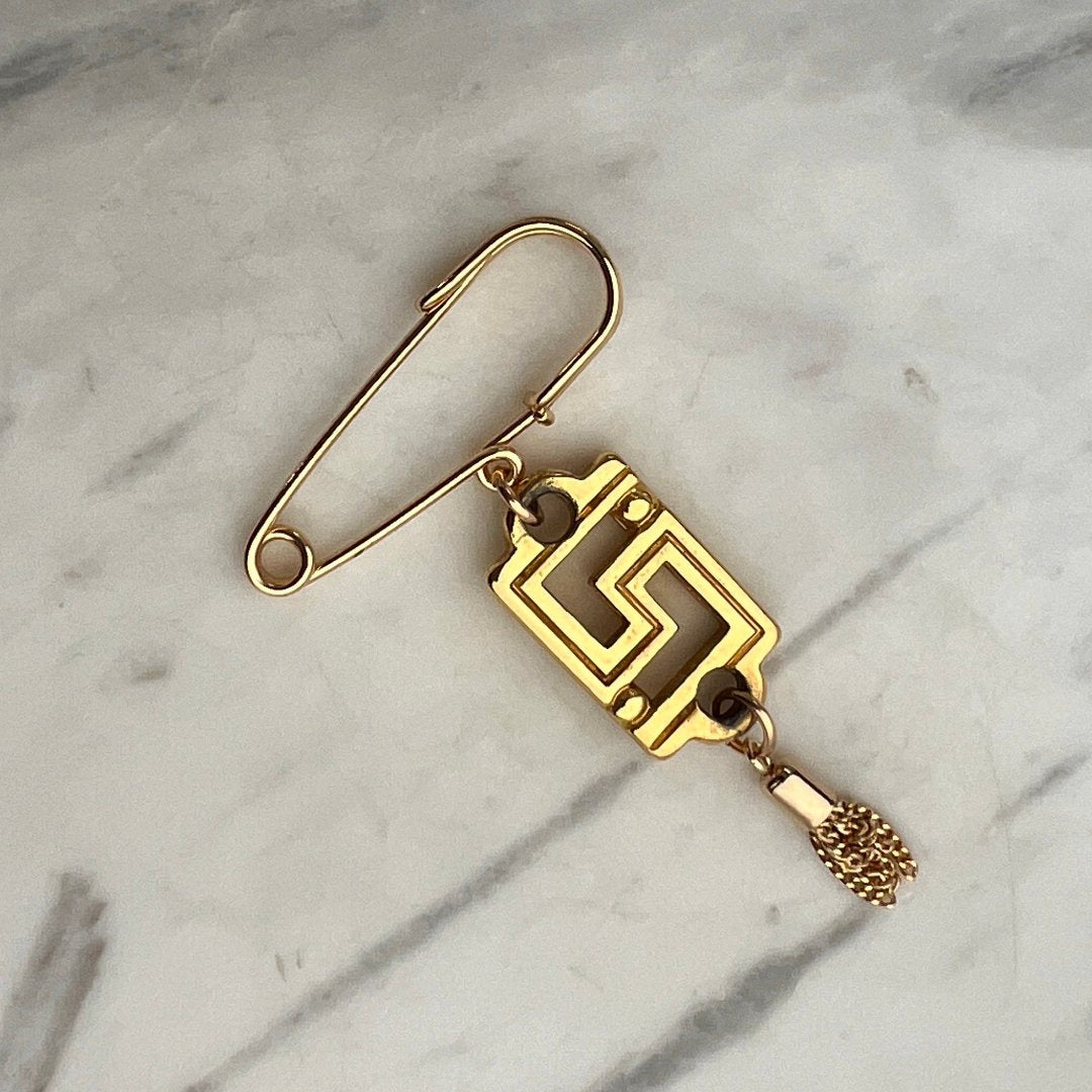 Gold Logo Brooch with Tassel