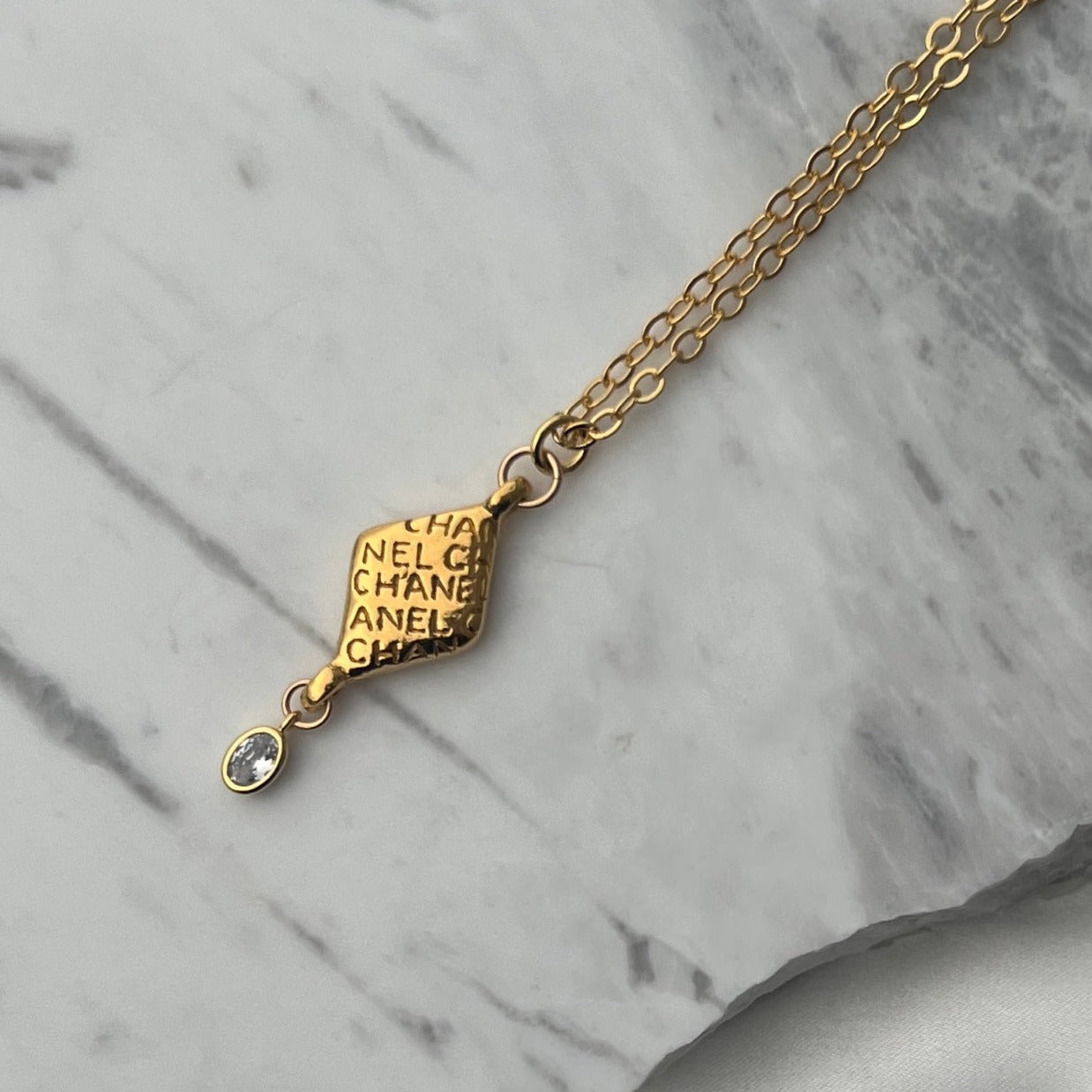 Gold Printed Necklace with Crystal Drop