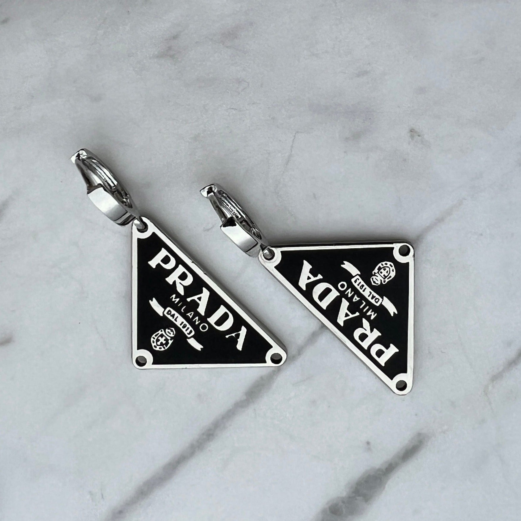 Triangular Black & Silver Logo Earrings