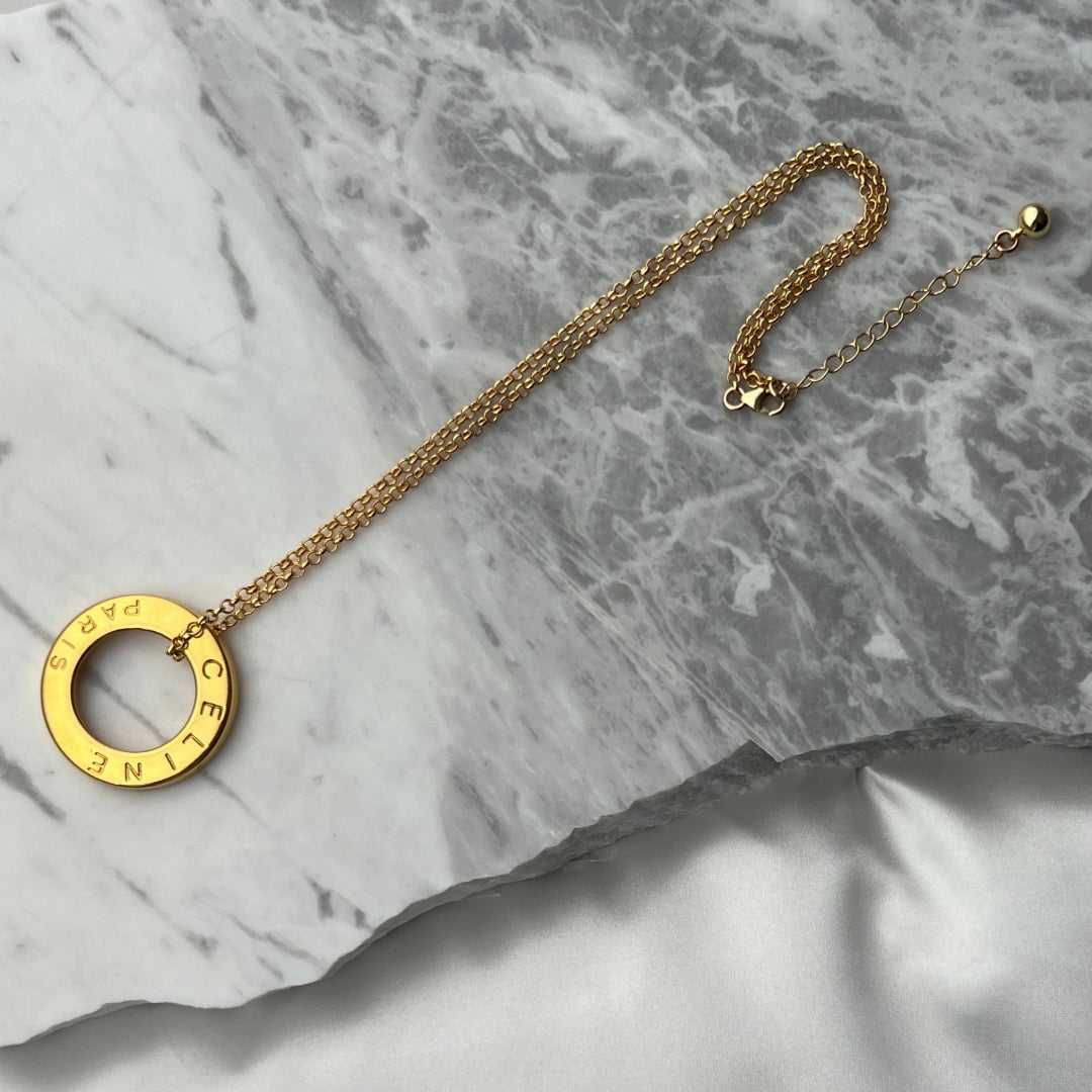 Statement Gold Logo Necklace