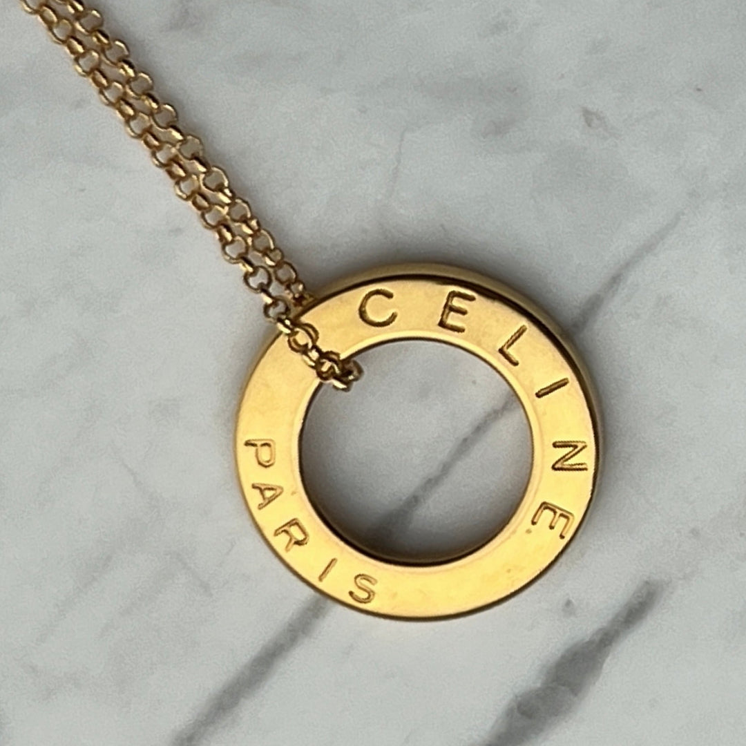 Statement Gold Logo Necklace