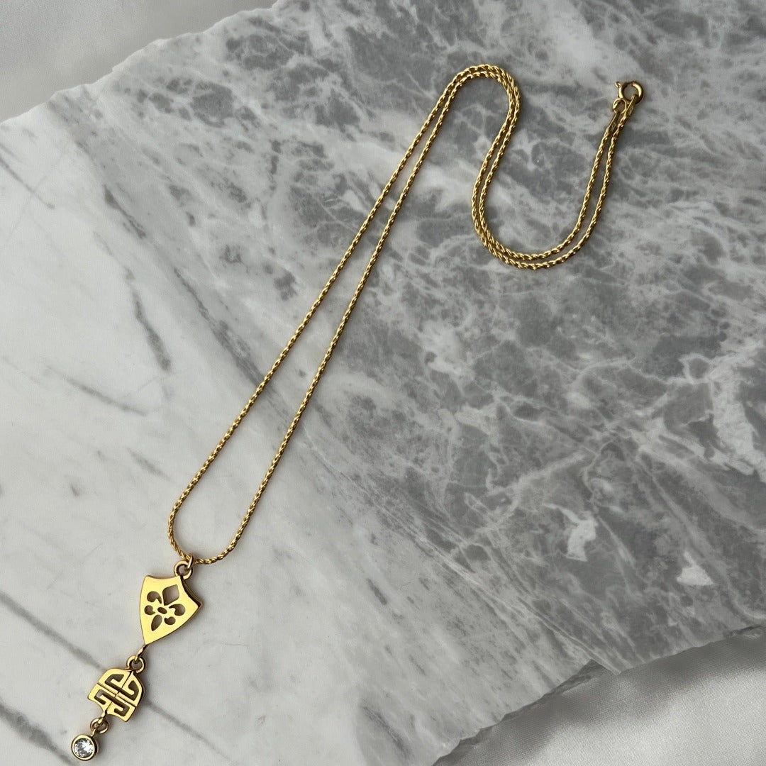 Statement Gold Double Logo Necklace with Crystal Drop