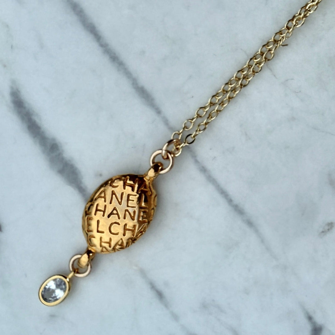Gold Oval Printed Necklace with Crystal Drop