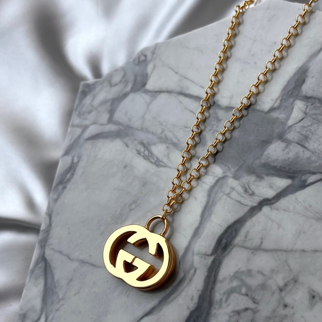 Statement Gold Logo Necklace